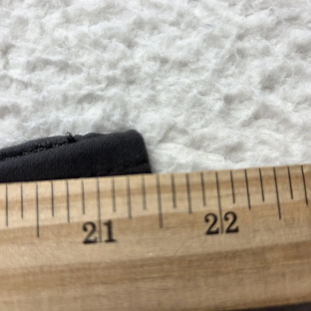 Wrangler holes material button